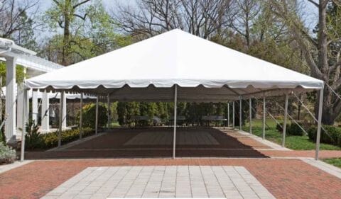 A large white canopy tent set up in an outdoor venue, perfect for events. This image demonstrates the kind of tent rental options available in Dhaka for outdoor gatherings, weddings, or parties.