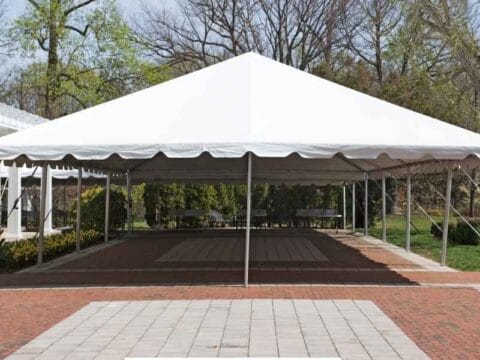 A large white canopy tent set up in an outdoor venue, perfect for events. This image demonstrates the kind of tent rental options available in Dhaka for outdoor gatherings, weddings, or parties.